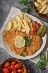 Homemade german schnitzel with pickles
