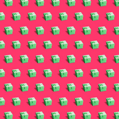 Green present boxes on deep red background