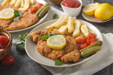 Homemade german schnitzel with pickles