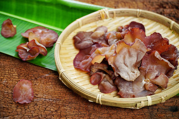 Auricularia auricula-judae or Jews ear mushrooms on white background. Organic fresh ear mushrooms for cooking vegetarian food, vegetarian food concept.