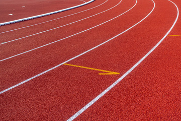 Red running track in stadium
