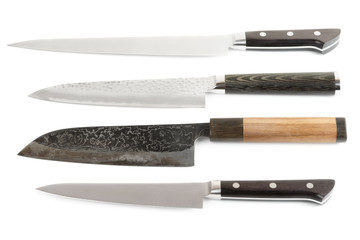 Set of new and used knives, isolated