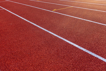 Red running track in stadium