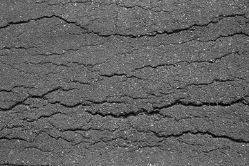 crack on asphalt road texture