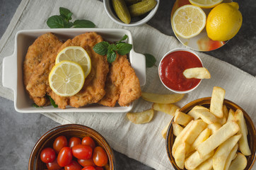 Homemade german schnitzel with pickles