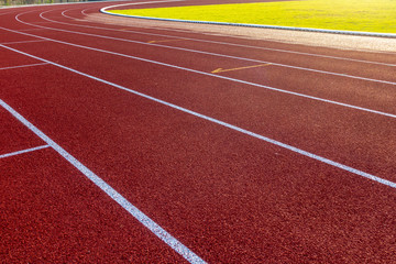 Fototapeta premium Red running track in stadium