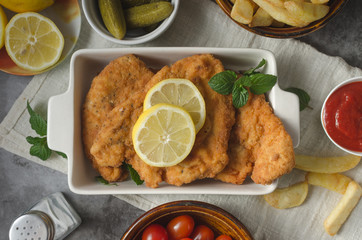 Homemade german schnitzel with pickles