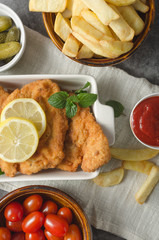 Homemade german schnitzel with pickles