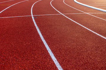 Red running track in stadium