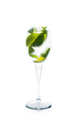 Royal mojito cocktail lime and mint isolated on white background. Selective focus. Shallow depth of field.