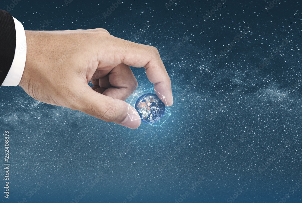 Poster hand picking globe with network connection graphic. element of this image are furnished by nasa