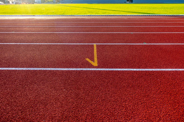 Red running track in stadium