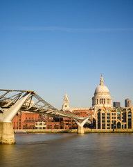 Fototapeta na wymiar St Paul's Cathedral and Millennium Footbridge over the Thames