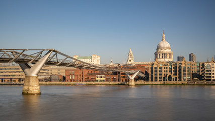 Fototapeta na wymiar St Paul's Cathedral and Millennium Footbridge over the Thames