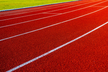 Red running track in stadium