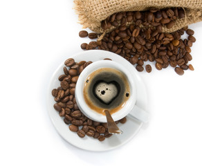 isolated image of a cup of coffee and coffee beans