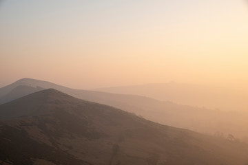 Stunning Winter sunrise landscape image of The Great Ridge in the Peak District in England with a...