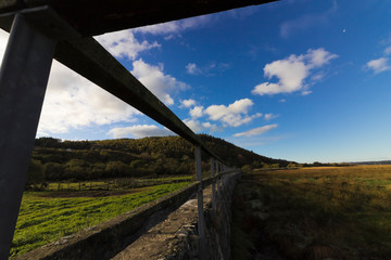 Fototapeta premium Coastal vista looking westwards along the shoreline of Red Wharf Bay from the Anglesey Coastal Path