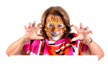 senior woman with tiger face-paint