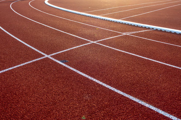 Red running track in stadium