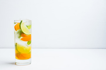 Mandarine mojito cocktail lime and mint. Selective focus. Shallow depth of field.