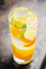 Mandarine mojito cocktail lime and mint. Selective focus. Shallow depth of field.