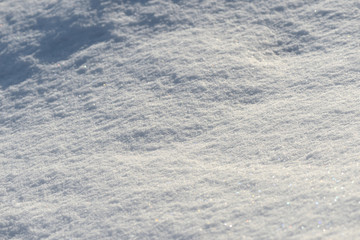 The texture of the snow close up. WInter background