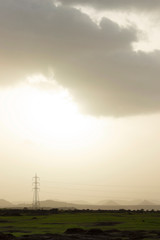 Obraz premium Power tower in cloudy weather, Maharashtra, India.
