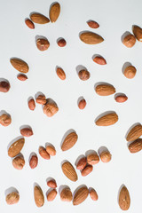 Pattern of nuts mix with copy space. Various nuts isolated on white.