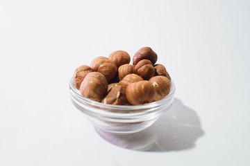 The top view of hazelnuts isolated on white background
