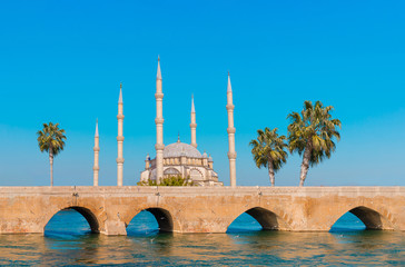 Islamic Mosque in Adana, Seyhan city of Turkey at blue sky .