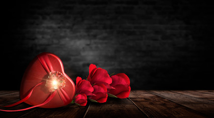 Romantic background with flowers, red roses and a box, a heart-shaped box. Night lanterns, the magical atmosphere of the evening. The scenery is romance. Love stories for women. Night view.