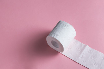 Roll Of Toilet Paper Isolated On pink Background