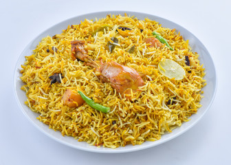Chicken Biryani, a yummy & fluffy rice dish with spicy savory chicken pieces with salad.