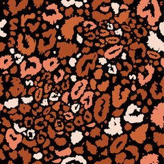 Seamless leopard wild nature pattern on black. Vector animal print.