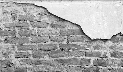 black and white damage brick wall