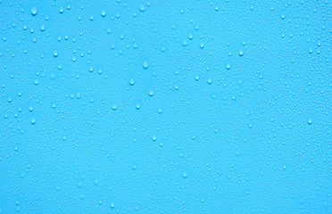 water drop on blue plastic texture