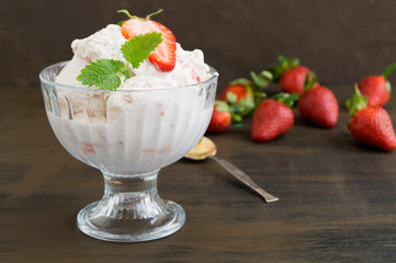 Ice cream balls in a glass vase.