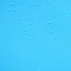 water drop on blue plastic texture