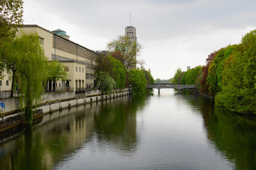 isar river mirroring constructions and trees