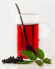 Elderberry tea and  in a glass cup
