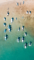 Aerial shot of local boats in El Nido Beach, Palawan, Philippines