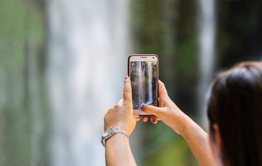 photo shooting on smartphone in tourist journey