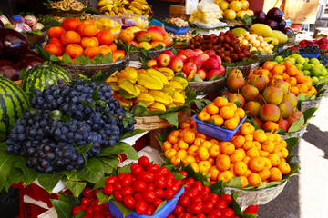 Naklejka na ściany i meble Colorful fruit at the market in Dali, Yunnan, China