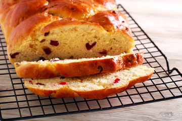 Fruit bread braid, sliced on rack