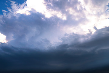 Scary epic sky with menacing clouds. Hurricane wind with a thunderstorm. Stock background, photo