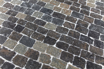 The stone blocks cleared of snow as a background