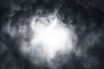 Scary epic sky with menacing clouds. Hurricane wind with a thunderstorm. Stock background, photo