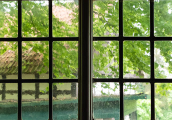 The window of an old farmhouse inside