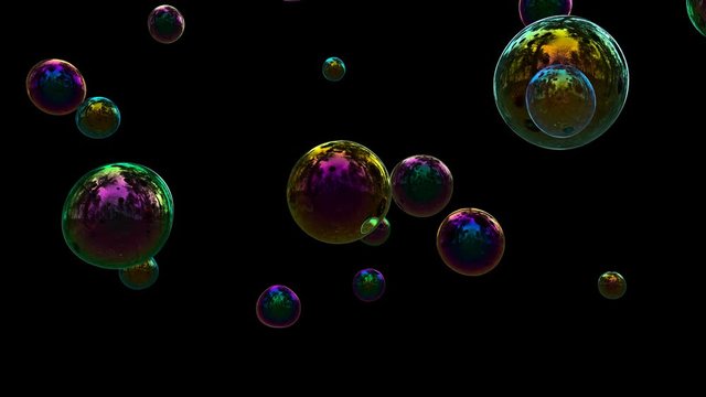 Multiple soap bubles floating and popping 